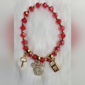 $8 Elegant Red Beaded Bracelet with Gold Accents